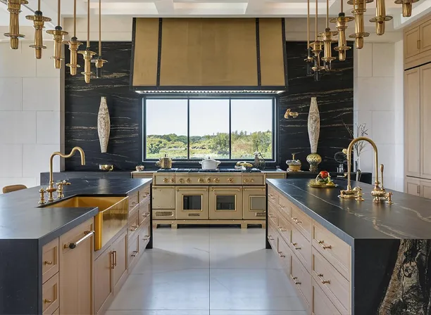 Editorial luxury kitchen with stone island and integrated cabinetry