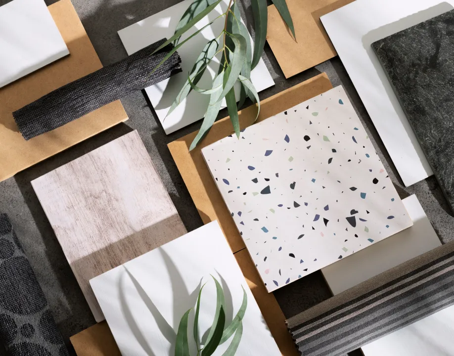 Luxury material palette with hardwood, stone, and metal finishes