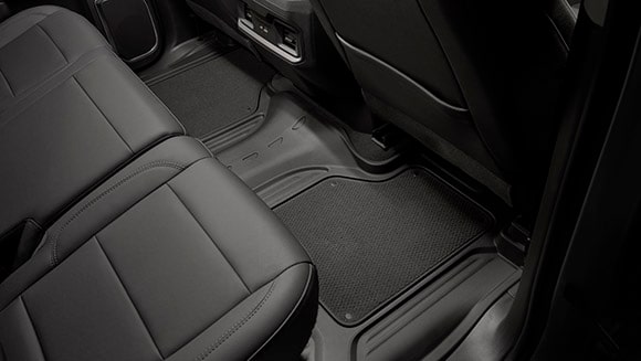 Rear floor liners with removable carpet inserts